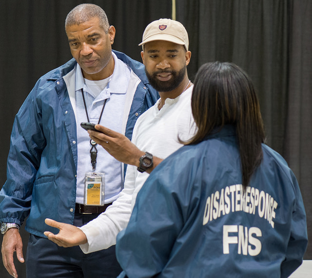 Three disaster response workers