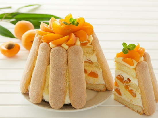 apricot charlotte with a slice removed