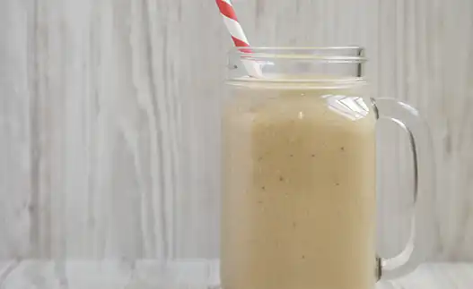 glass jar with a shake and straw