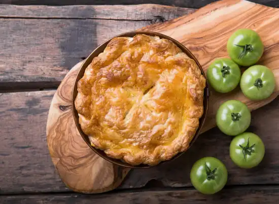 pie with green tomatoes to the side