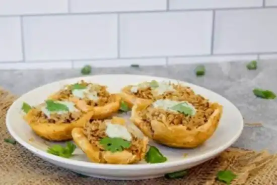 plate of plantain cups with shredded chicken