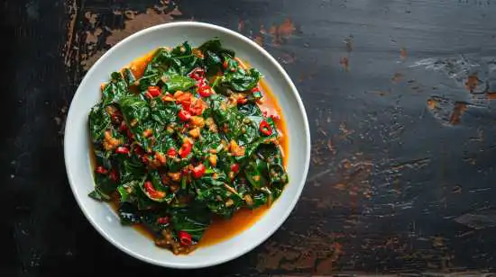 plate of spinach and peppers