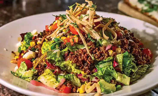a plate with taco salad
