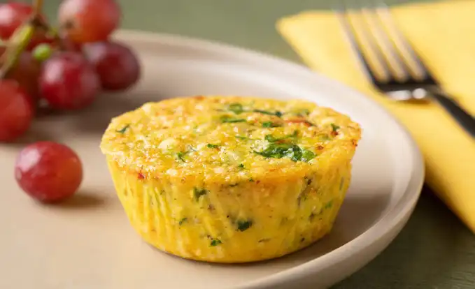 egg bite on a plate with tomatoes