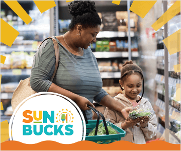 A graphic displaying an image of a woman grocery shopping with a child. The top-half of the image is surrounded by sunrays. The SUN Bucks logo appears in the bottom left corner.