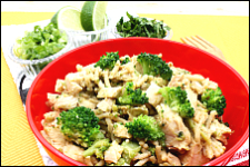 Bowl of noodles with broccoli and peanut butter sauce