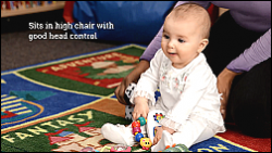Infant Sitting Up with Child Care Provider