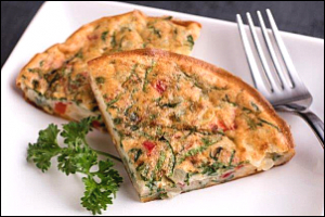 two triangular pieces of quiche on a plate