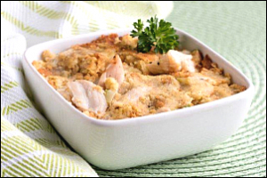 Bowl with turkey, dressing, vegetables and herbs
