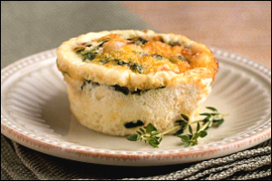 Frittata muffin with eggs, mushrooms, and other ingredients