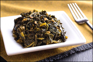plate with cooked kale and other ingredients