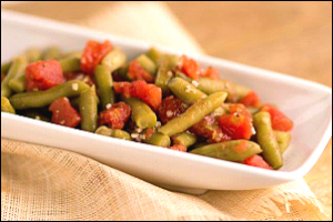 dish of green beans and diced tomatoes