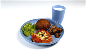 Roasted Spaghetti Squash topped with tomato sauce and cheese