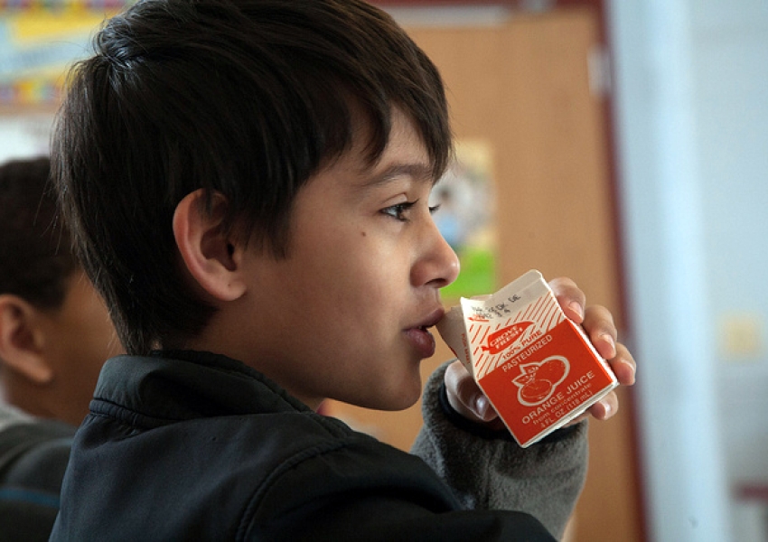 student drinking juice