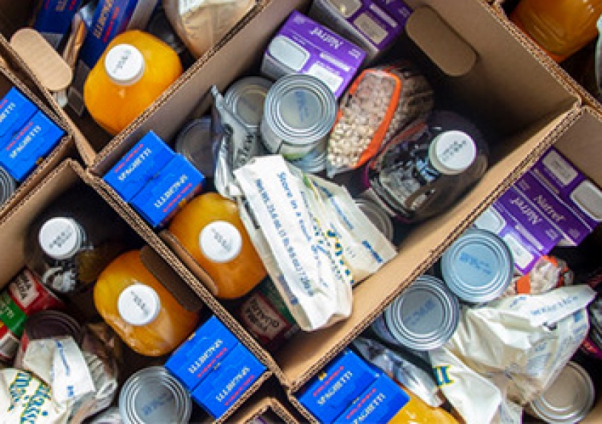 overhead angle photo of boxes of dry goods packed for distribution