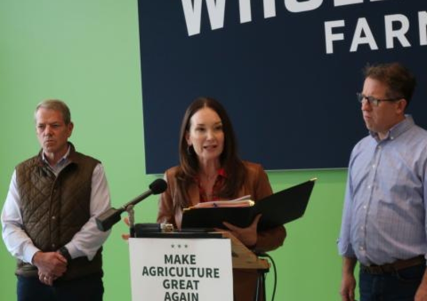 Secretary Rollins at a podium with a sign "Make Agriculture Great Again"