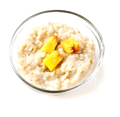 small glass bowl of oatmeal with peaches
