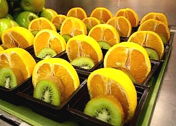 prepped orange and kiwi slices for school lunch