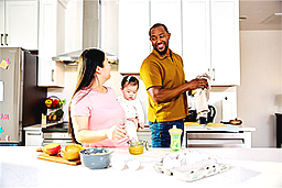a family cooking together in the kitchen
