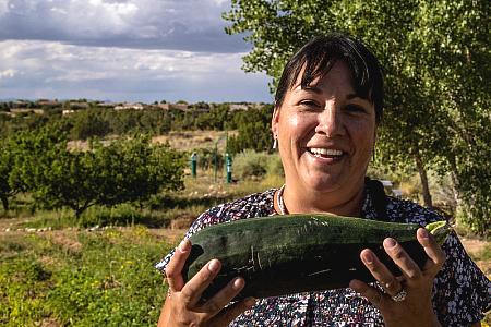 Holding a zucchini